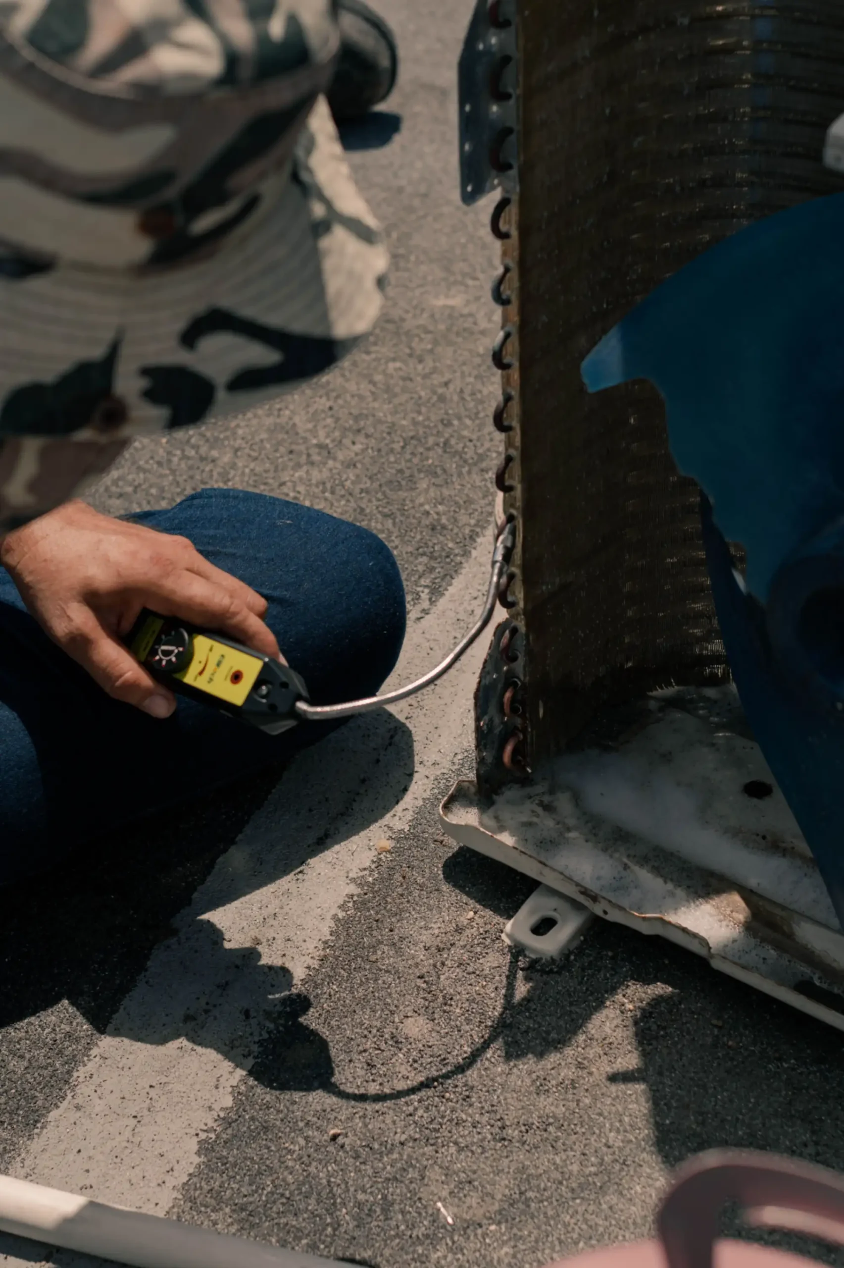 HVAC technician servicing residential equipment