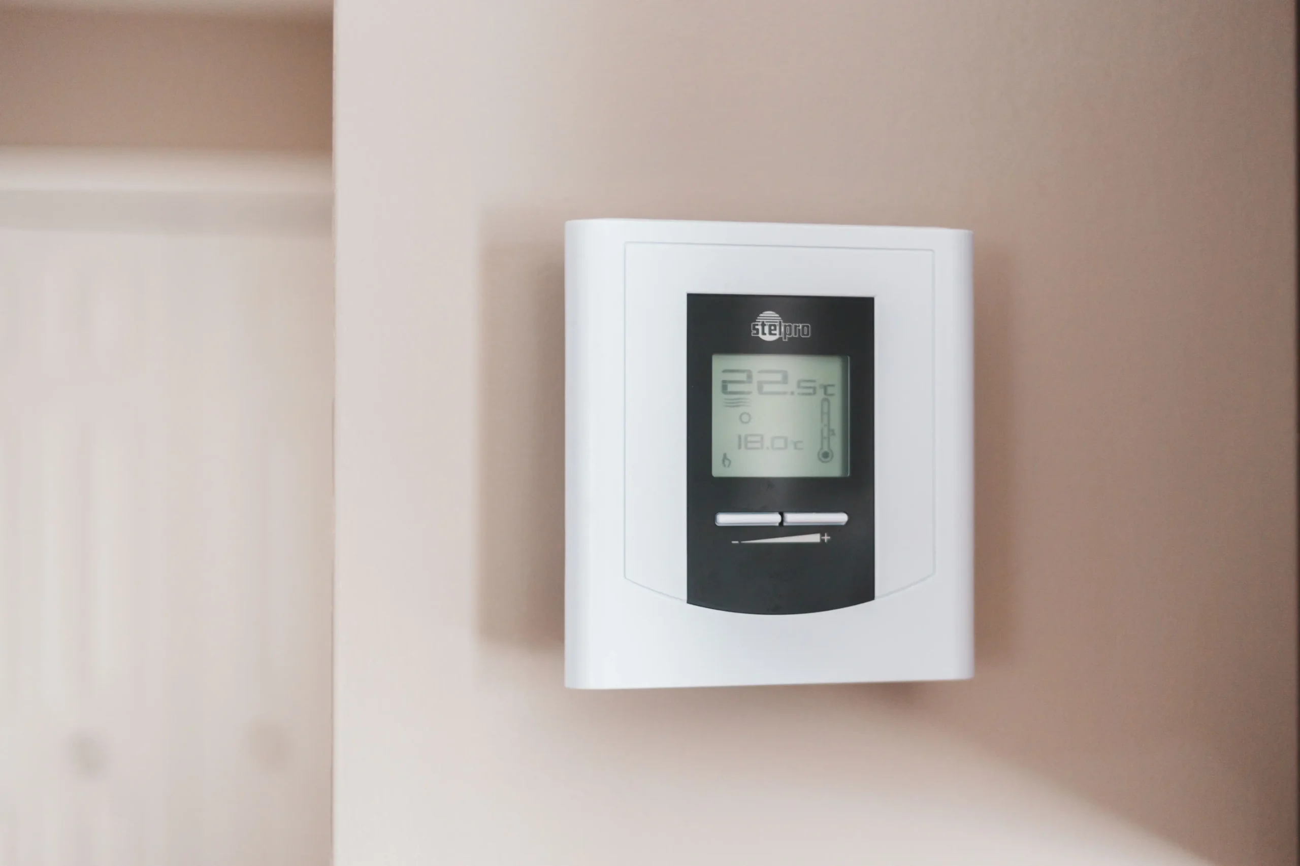Close-up of a residential thermostat used to control an HVAC system